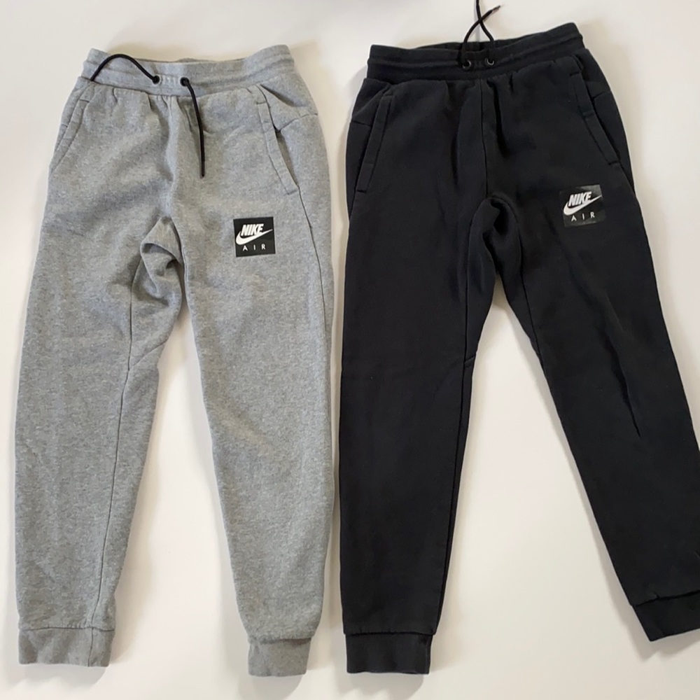 Two Nike boys sweatpants. Size M. Preowned.